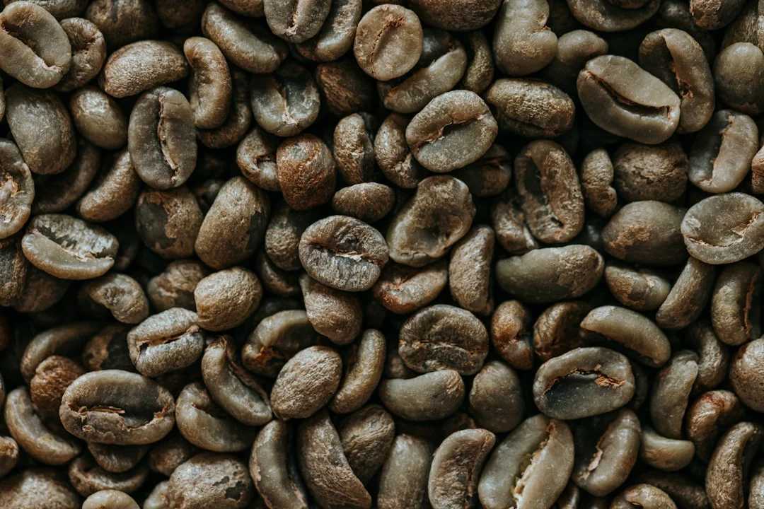 a pile of coffee beans that are brown
